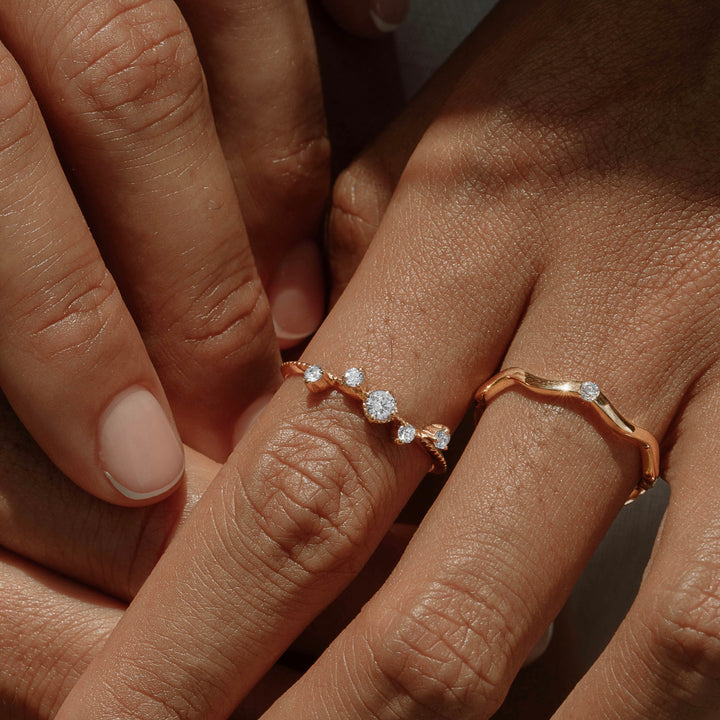 Kasai ring and anadyr ring worn on a woman left hand